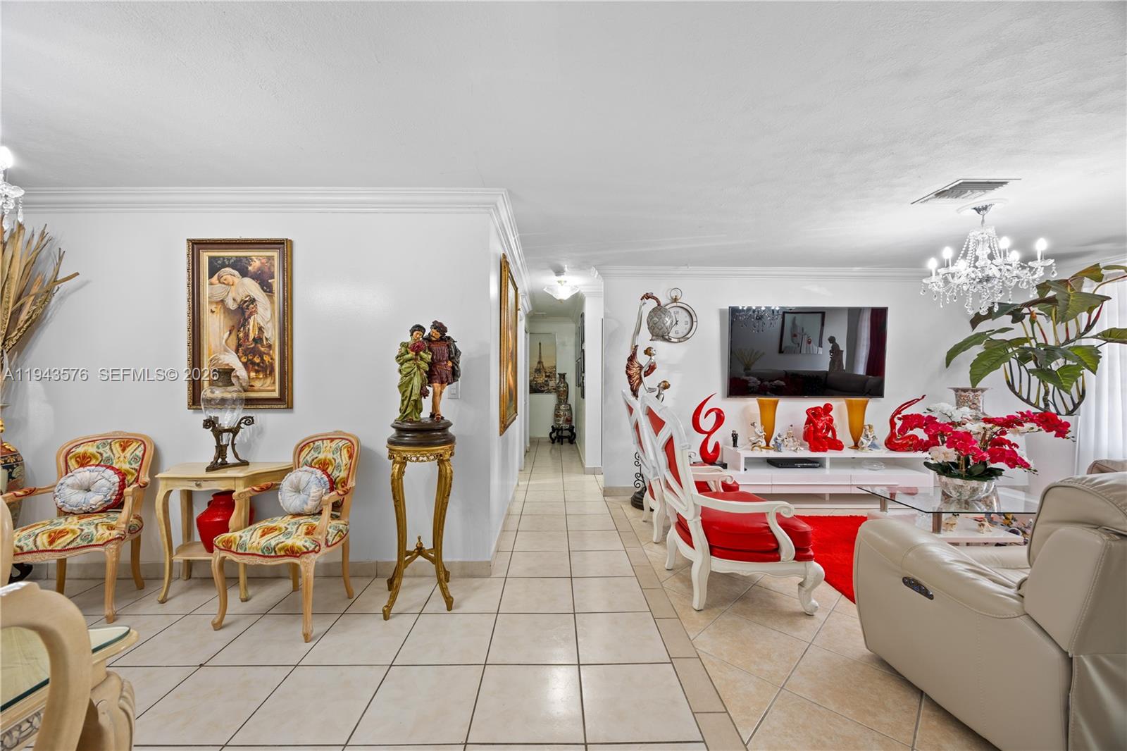 20150 Southwest 89th Court Cutler Bay, FL 33189 - Photo 11 of 48 a living room with lots of furniture and air hockey table