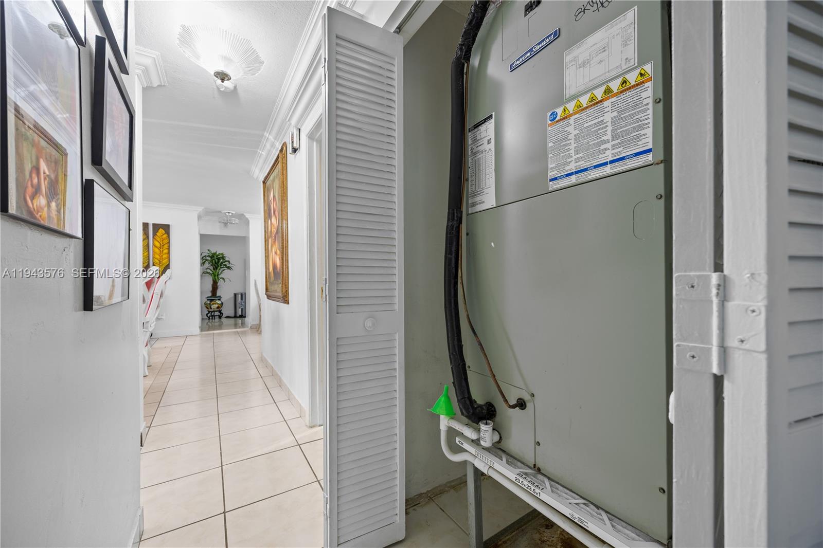 20150 Southwest 89th Court Cutler Bay, FL 33189 - Photo 27 of 48 a view of a hallway with wooden floor and staircase