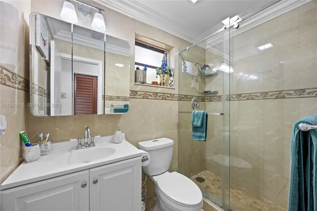 a kitchen with appliances cabinets and a sink