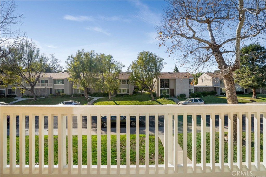 6486 Penn Street, Unit B Moorpark, CA 93021 - Photo 17 of 38 a view of a white house with a wooden fence