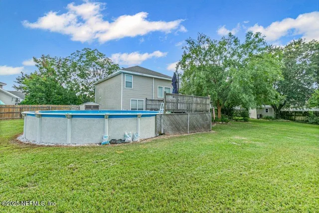 a view of a backyard with a garden