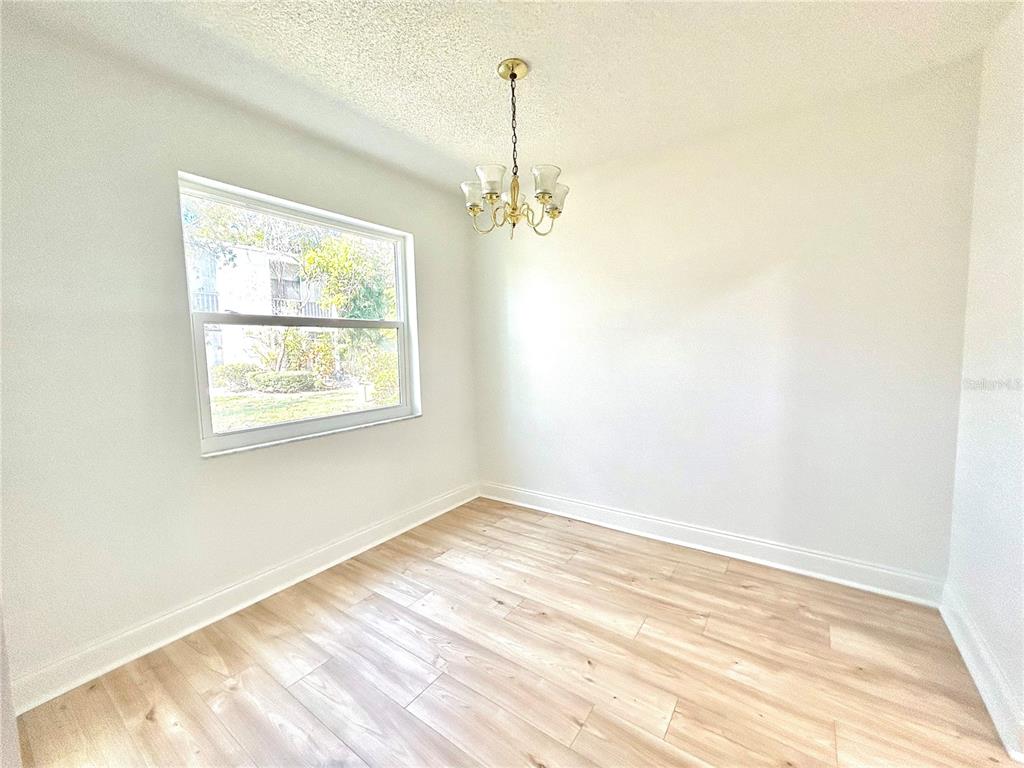 247 South McMullen Booth Road, Unit 23 Clearwater, FL 33759 - Photo 21 of 47 a view of a room with a window