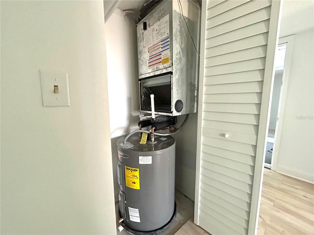 247 South McMullen Booth Road, Unit 23 Clearwater, FL 33759 - Photo 29 of 47 a view of water heater room