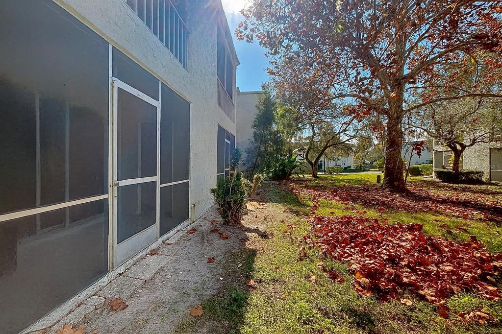 247 South McMullen Booth Road, Unit 23 Clearwater, FL 33759 - Photo 30 of 47 a view of backyard with outdoor space