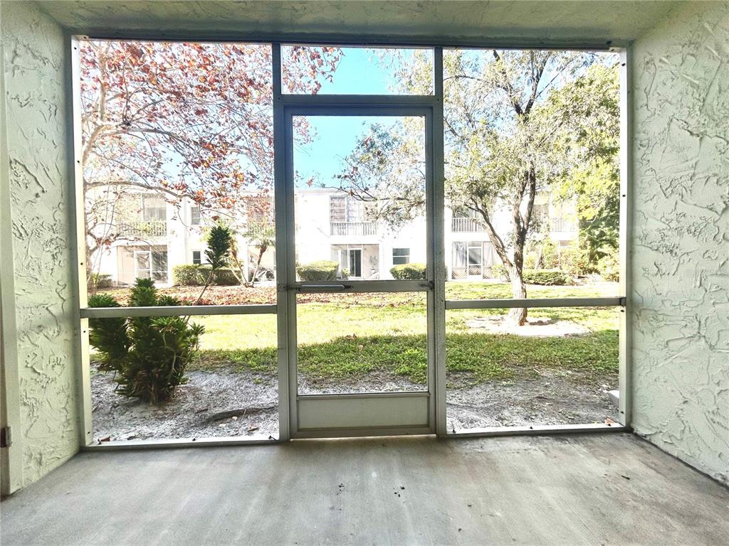 247 South McMullen Booth Road, Unit 23 Clearwater, FL 33759 - Photo 31 of 47 a view of a room with a large window