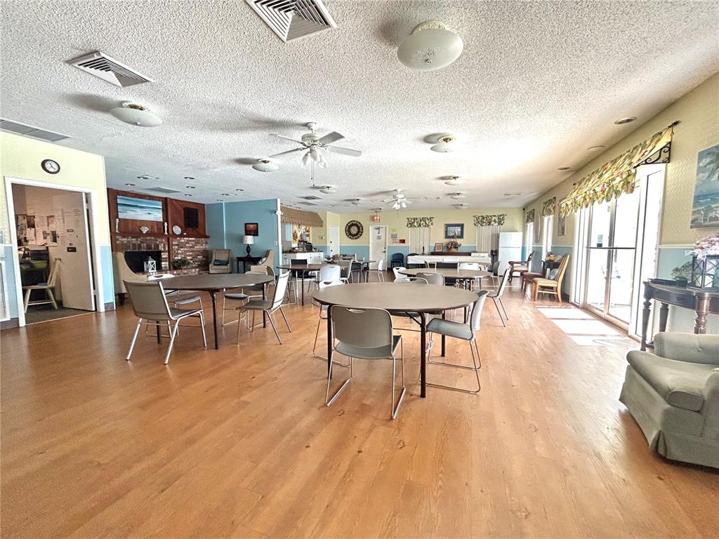 247 South McMullen Booth Road, Unit 23 Clearwater, FL 33759 - Photo 39 of 47 a living room with lots of furniture and view of kitchen