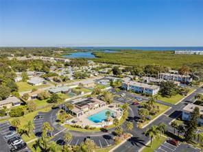 247 South McMullen Booth Road, Unit 23 Clearwater, FL 33759 - Photo 47 of 47 an aerial view of ocean and residential houses with outdoor space