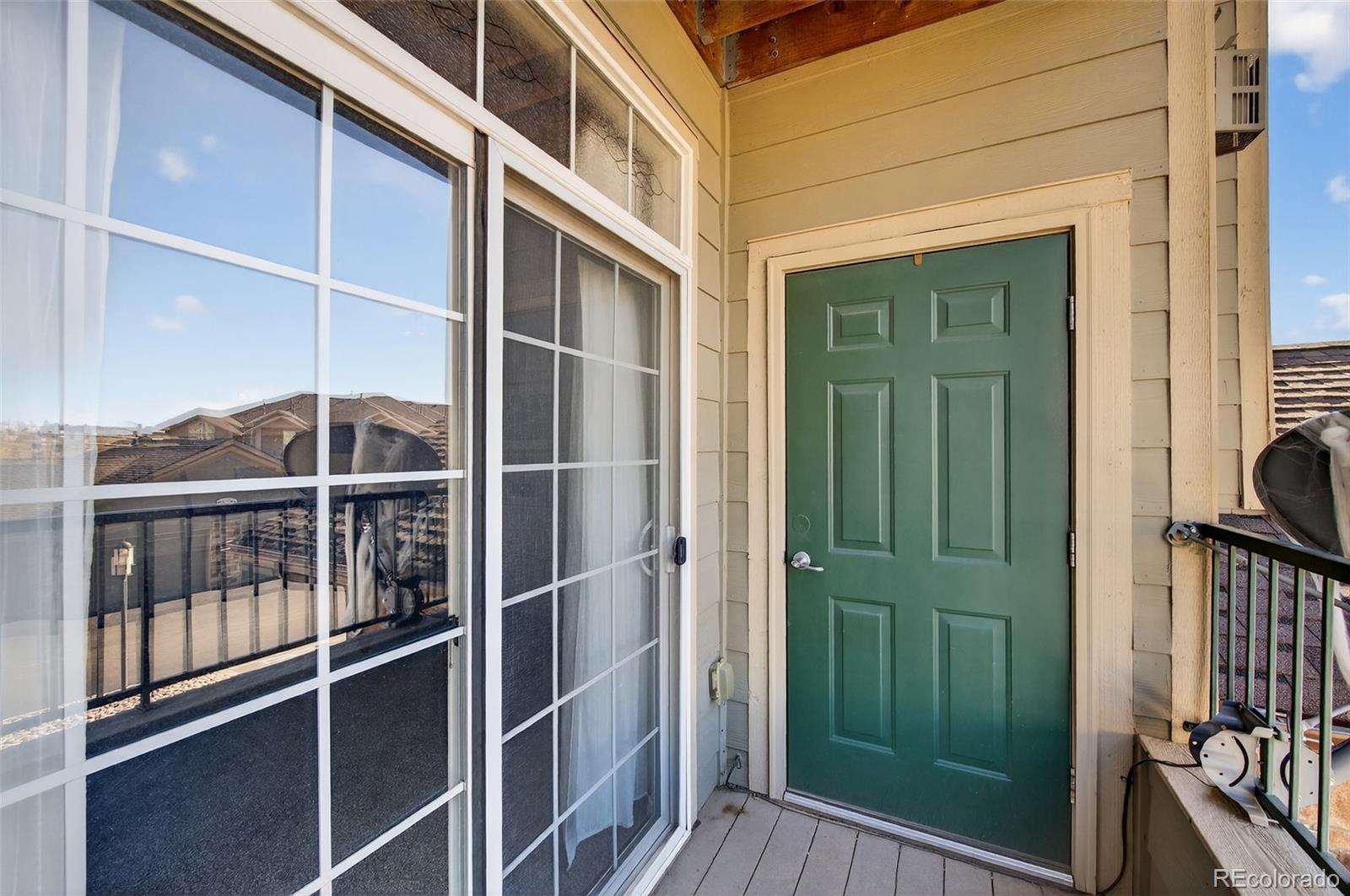 18611 Stroh Road, Unit 5203 Parker, CO 80134 - Photo 13 of 24 a view of a house with a door and a window