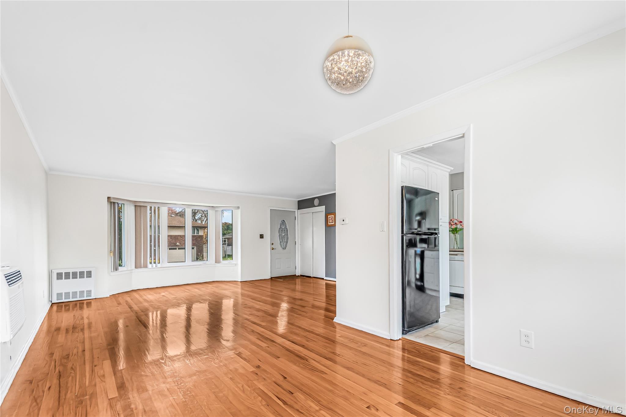 2 Deer Path Lane Syosset, NY 11791 - Photo 11 of 41 a view of empty room with wooden floor