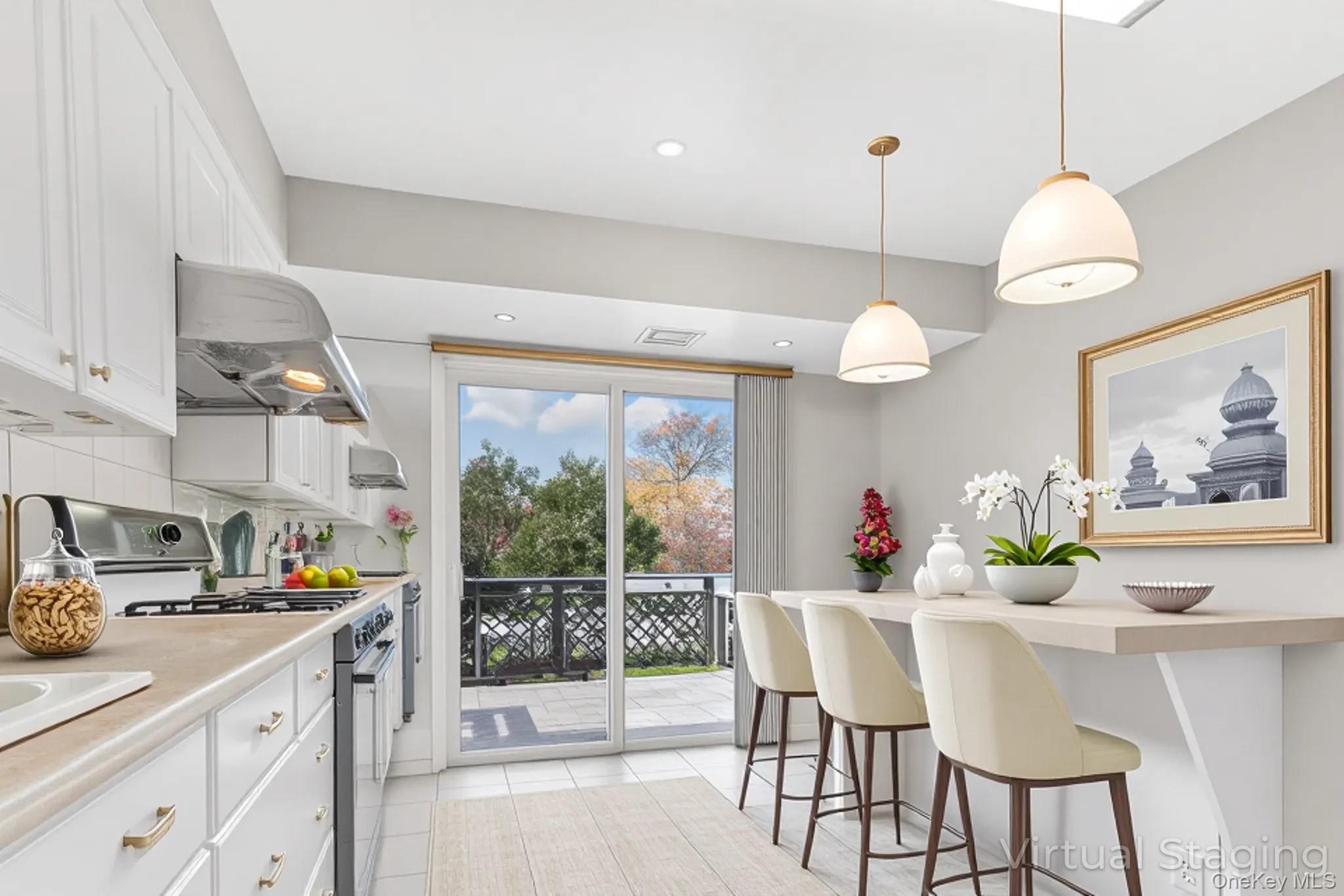 2 Deer Path Lane Syosset, NY 11791 - Photo 15 of 41 a view of a dining room and a table or chairs