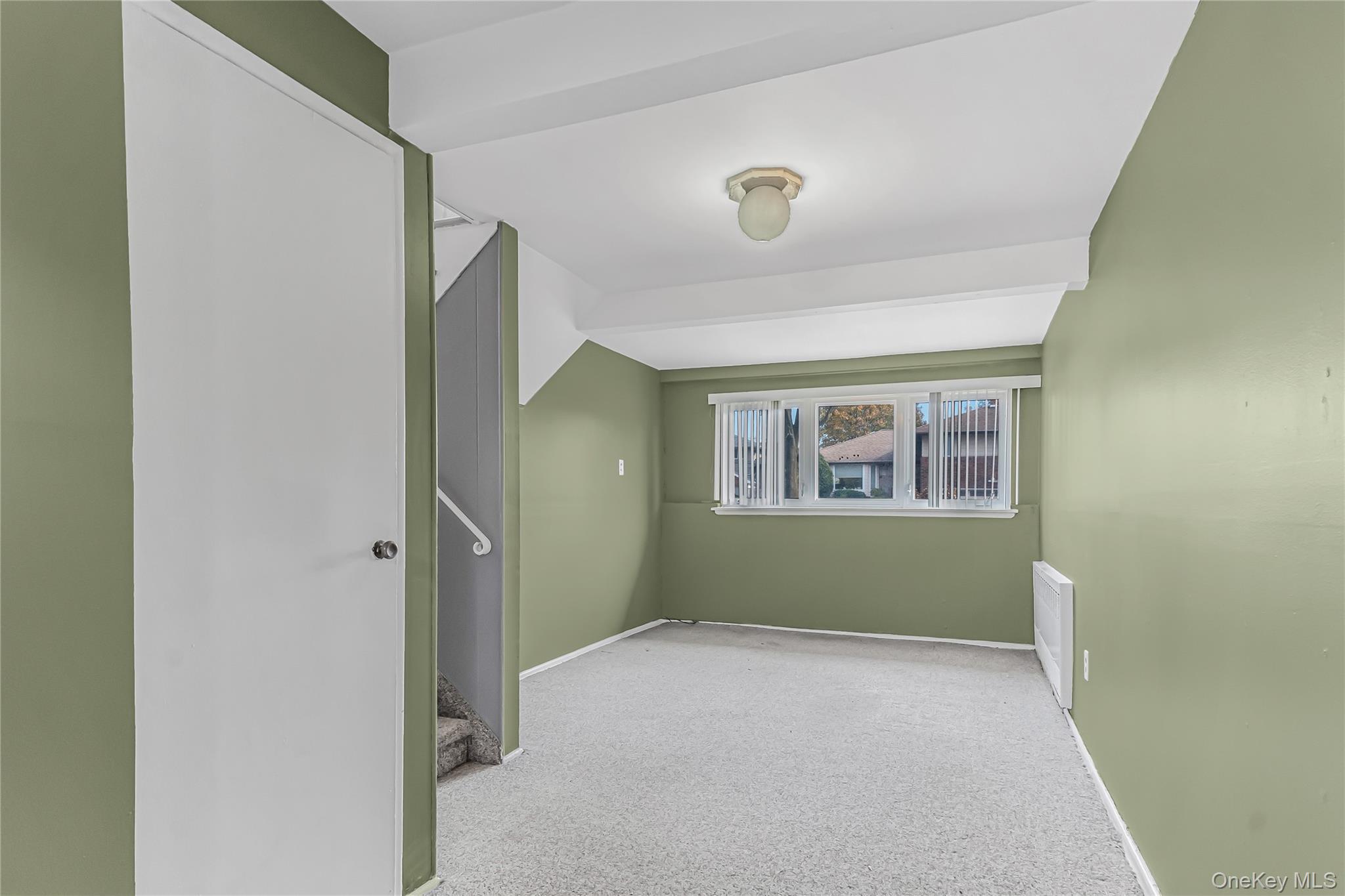 2 Deer Path Lane Syosset, NY 11791 - Photo 18 of 41 a view of an empty room with a window