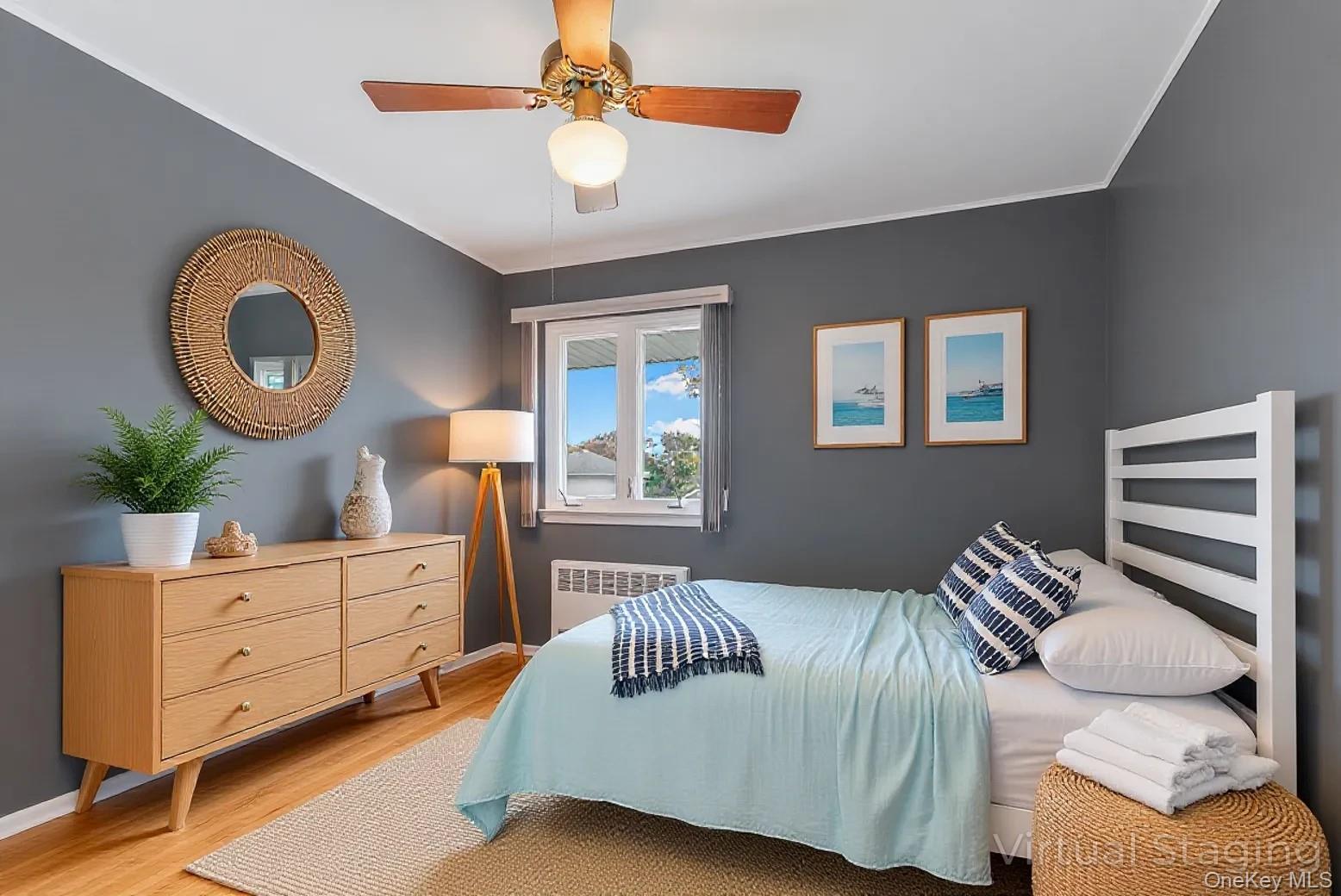 2 Deer Path Lane Syosset, NY 11791 - Photo 23 of 41 a bedroom with a bed and a chandelier