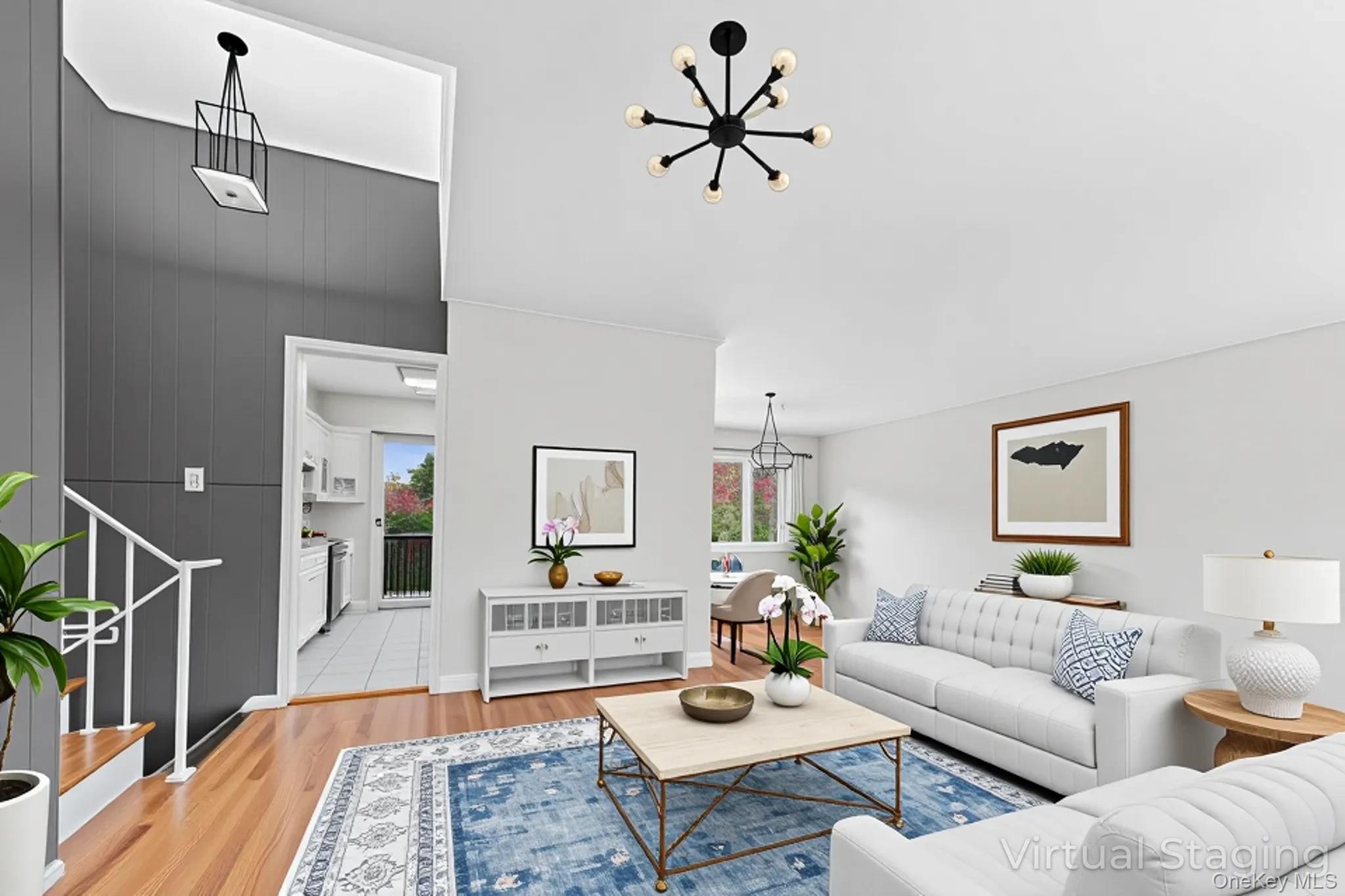 2 Deer Path Lane Syosset, NY 11791 - Photo 3 of 41 a living room with furniture and a wooden floor