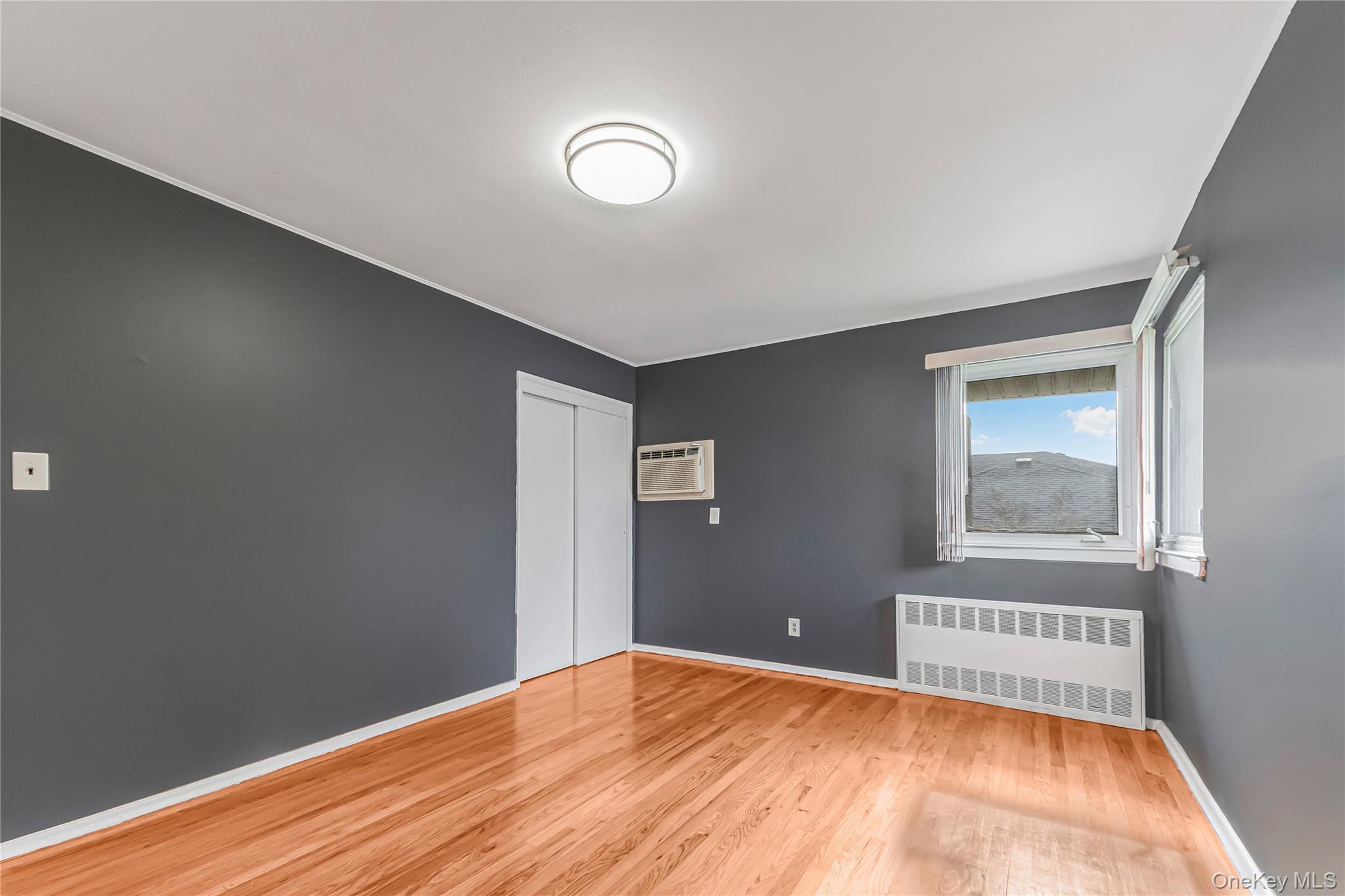 2 Deer Path Lane Syosset, NY 11791 - Photo 31 of 41 a view of an empty room and window