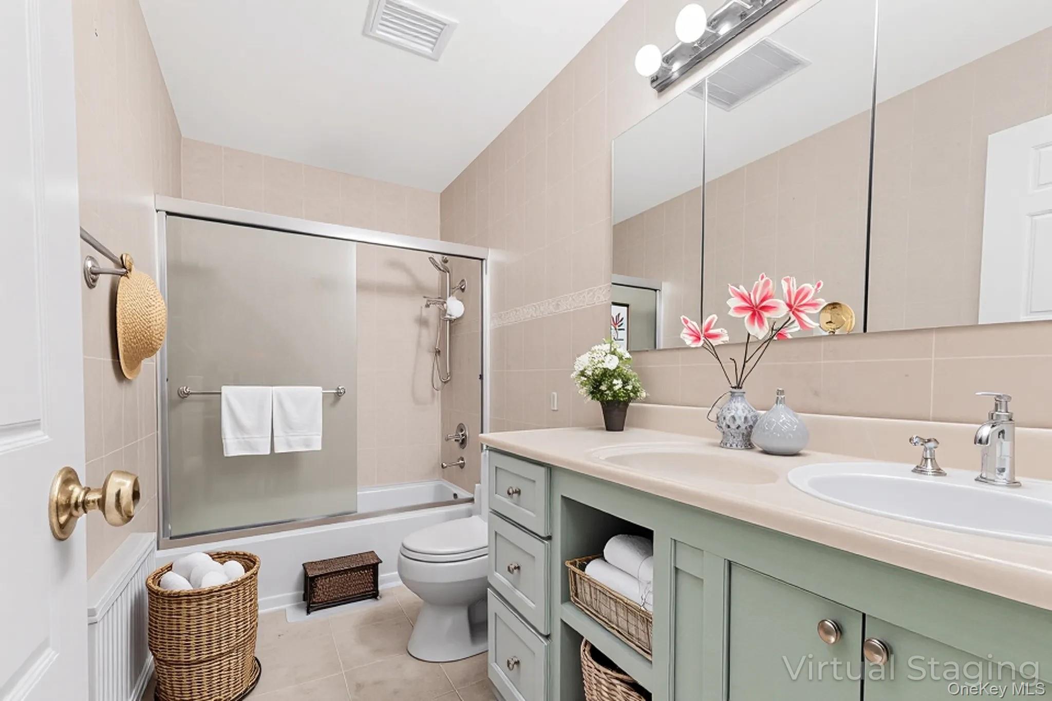 2 Deer Path Lane Syosset, NY 11791 - Photo 33 of 41 a bathroom with a granite countertop sink a toilet and a mirror