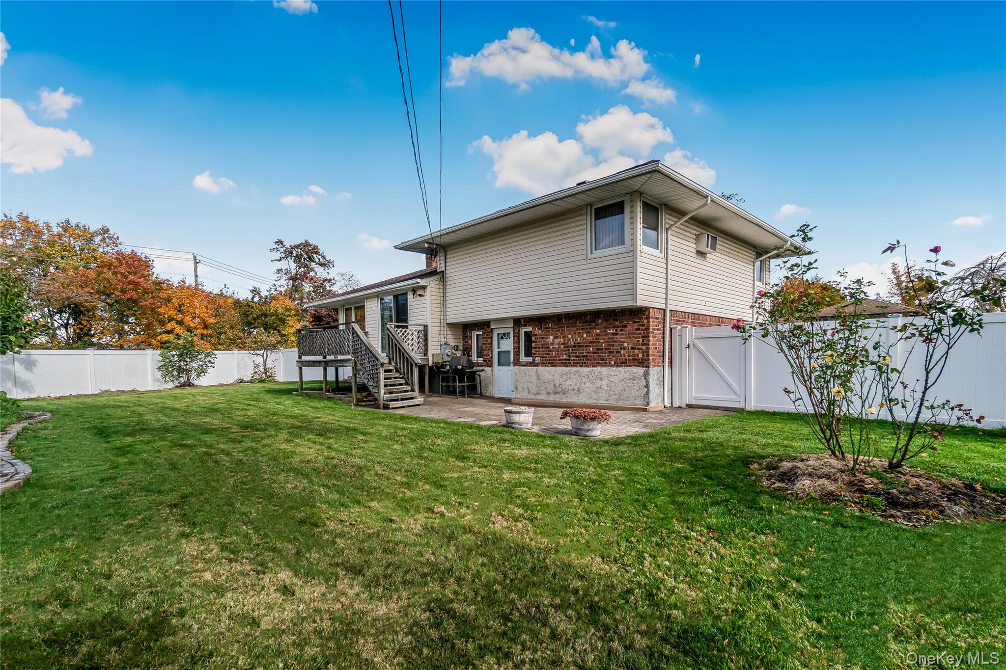 2 Deer Path Lane Syosset, NY 11791 - Photo 38 of 41 a house view with a garden space