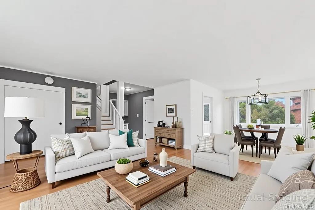 2 Deer Path Lane Syosset, NY 11791 - Photo 5 of 41 a living room with furniture and wooden floor