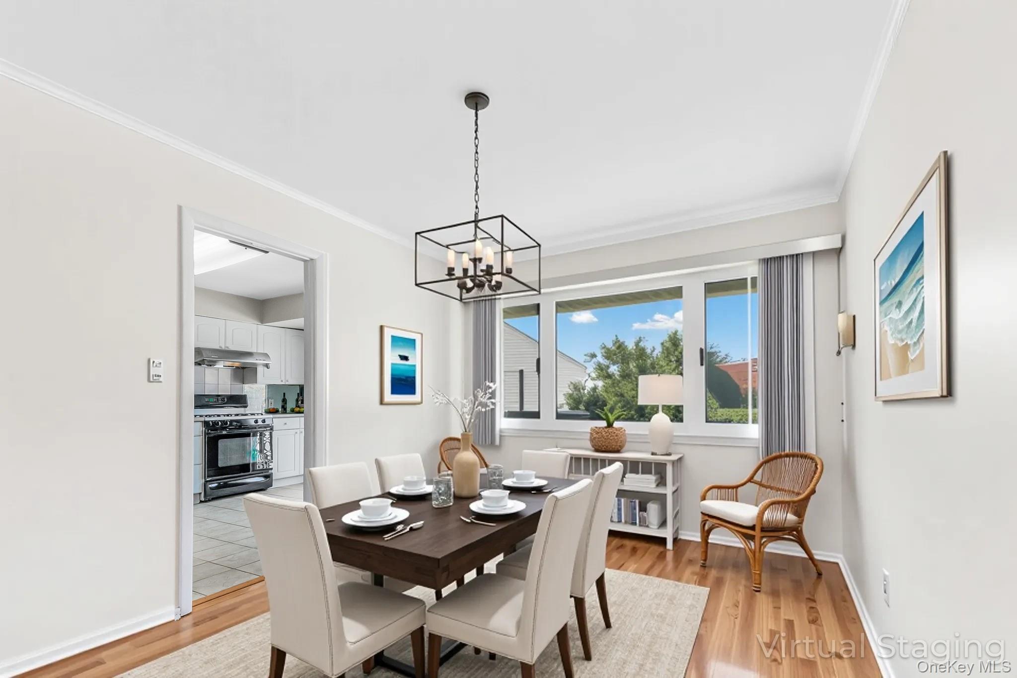 2 Deer Path Lane Syosset, NY 11791 - Photo 9 of 41 a dining room with furniture a chandelier and wooden floor