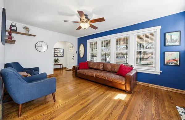 a living room with furniture or window and a fireplace