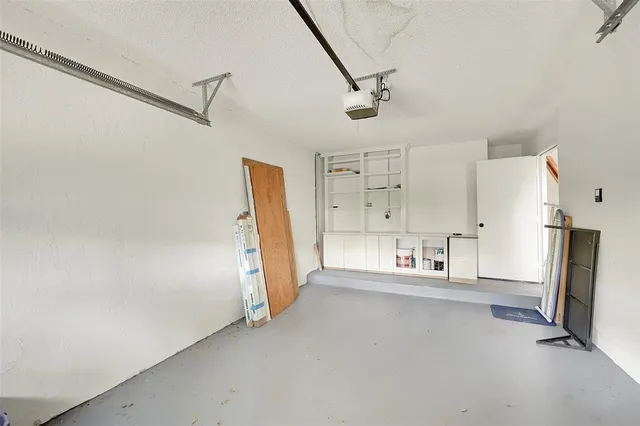 a view of a swimming pool with an outdoor seating