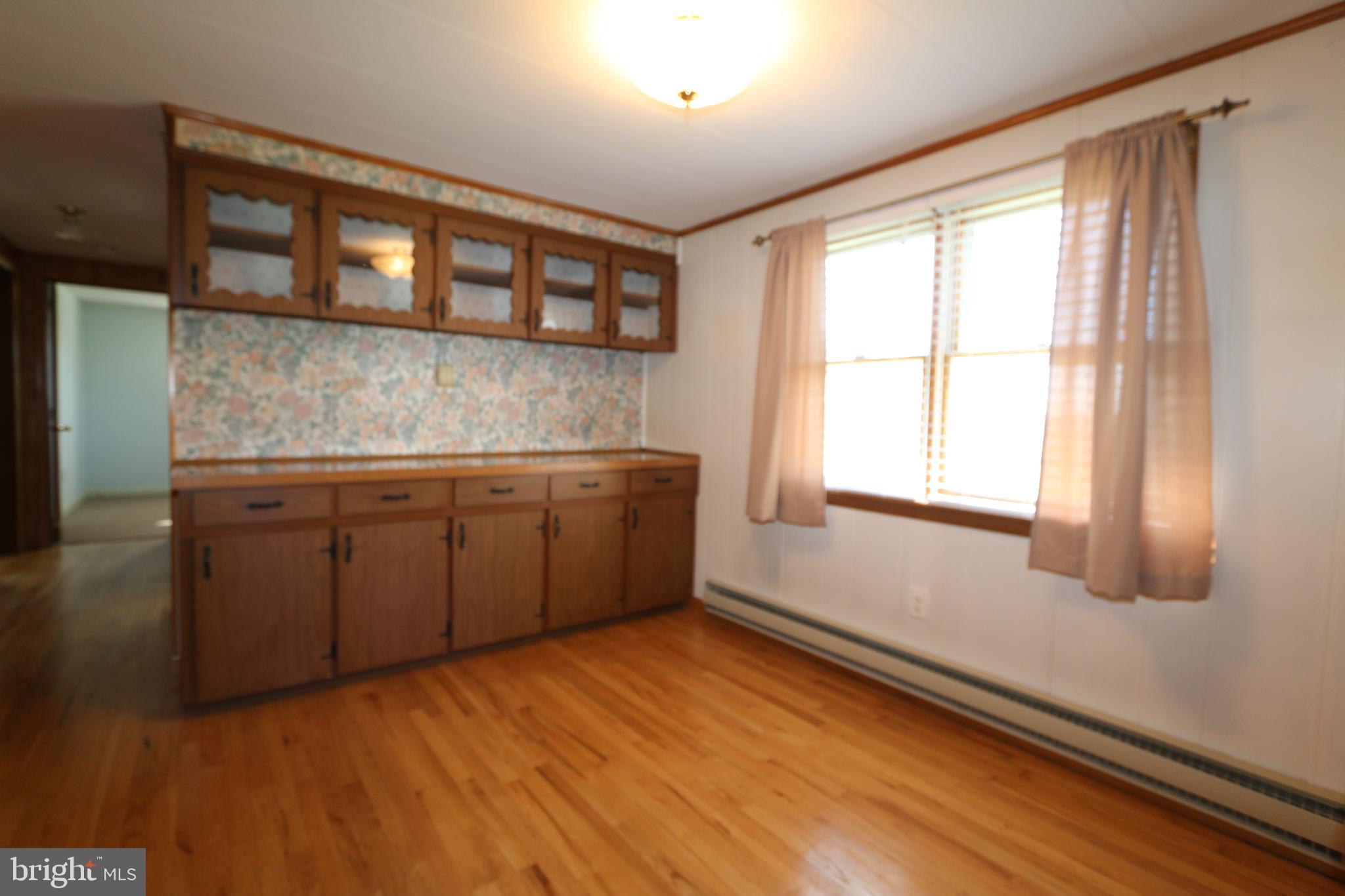 16541 Fairview Road Hagerstown, MD 21740 - Photo 3 of 19 Dining Room With Hardwood Floors
