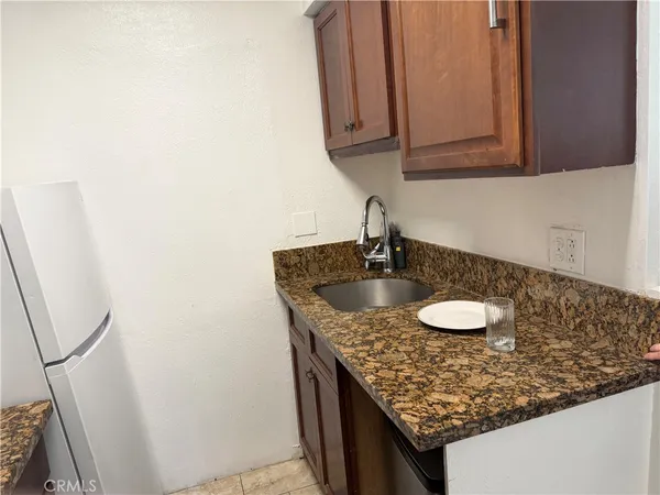 a bathroom with sink and mirror