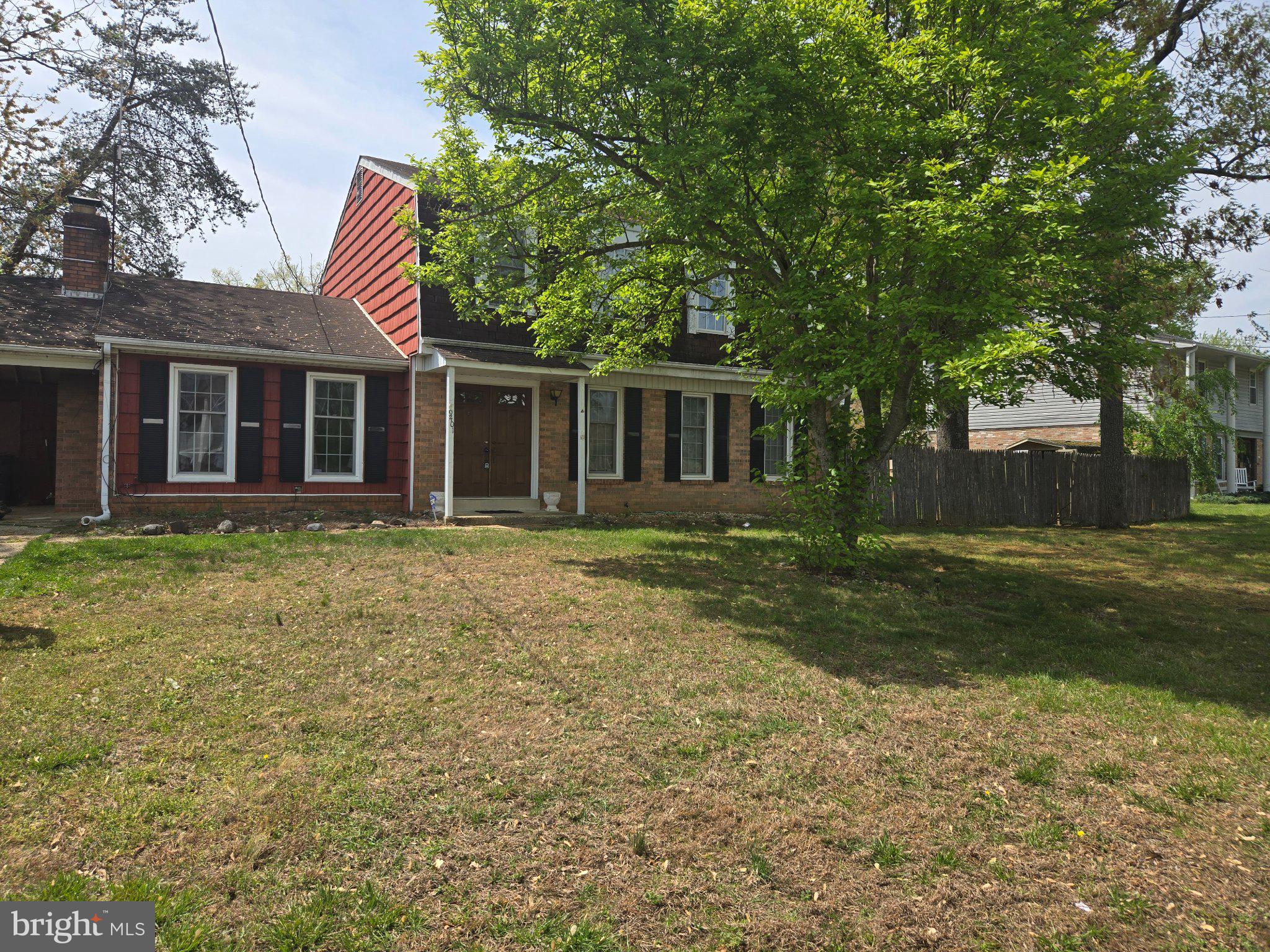 9401 Pine View Lane Clinton, MD 20735 - Photo 1 of 15 a front view of a house with a yard