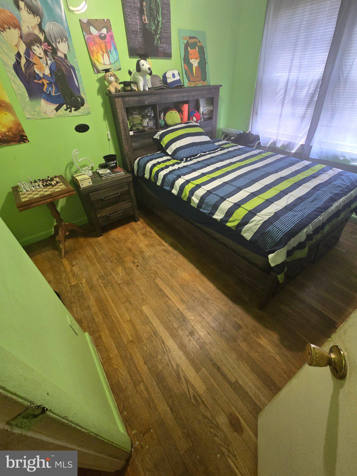 9401 Pine View Lane Clinton, MD 20735 - Photo 10 of 15 a bedroom with a bed next to a window