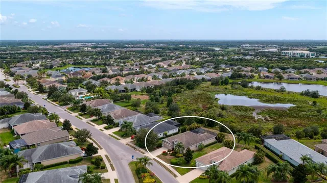 an aerial view of a house with a garden