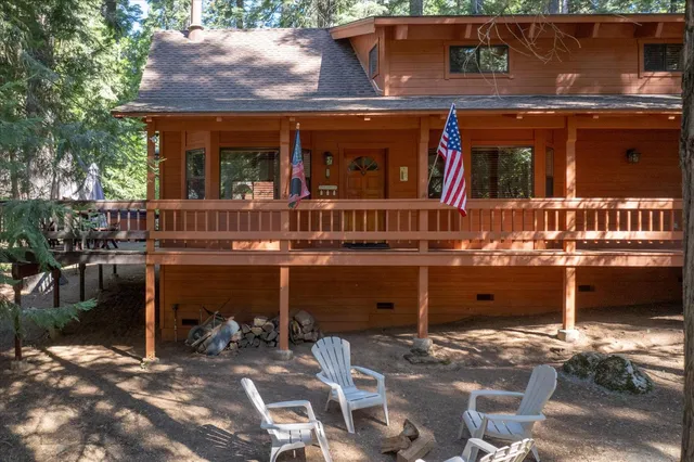 a view of a brick house with a glass door