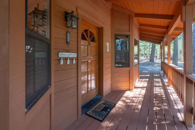 a bed room with a bed and a chair