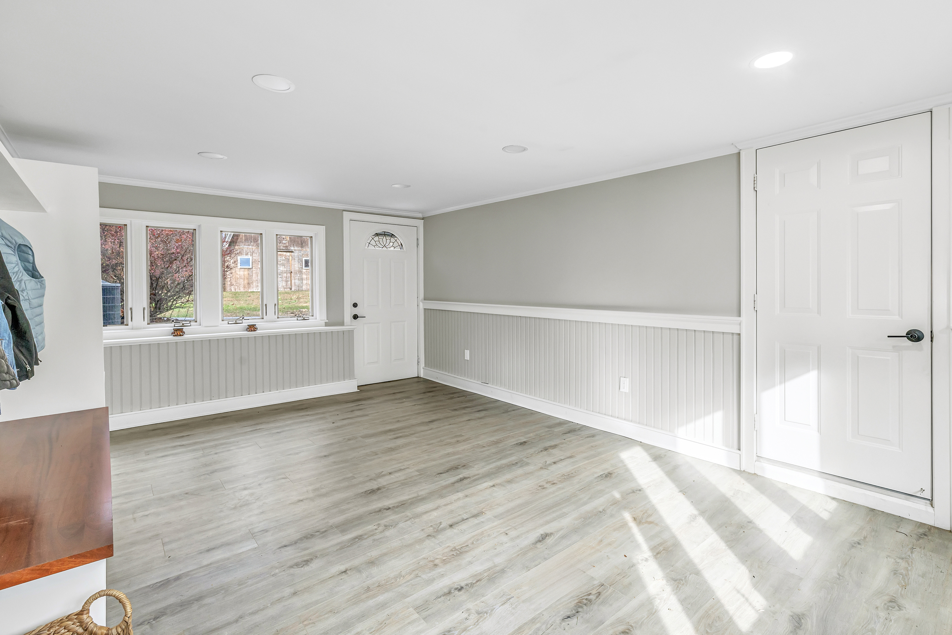 13 School Street Monroe, CT 06468 - Photo 17 of 29 a view of an empty room with a window and wooden floor