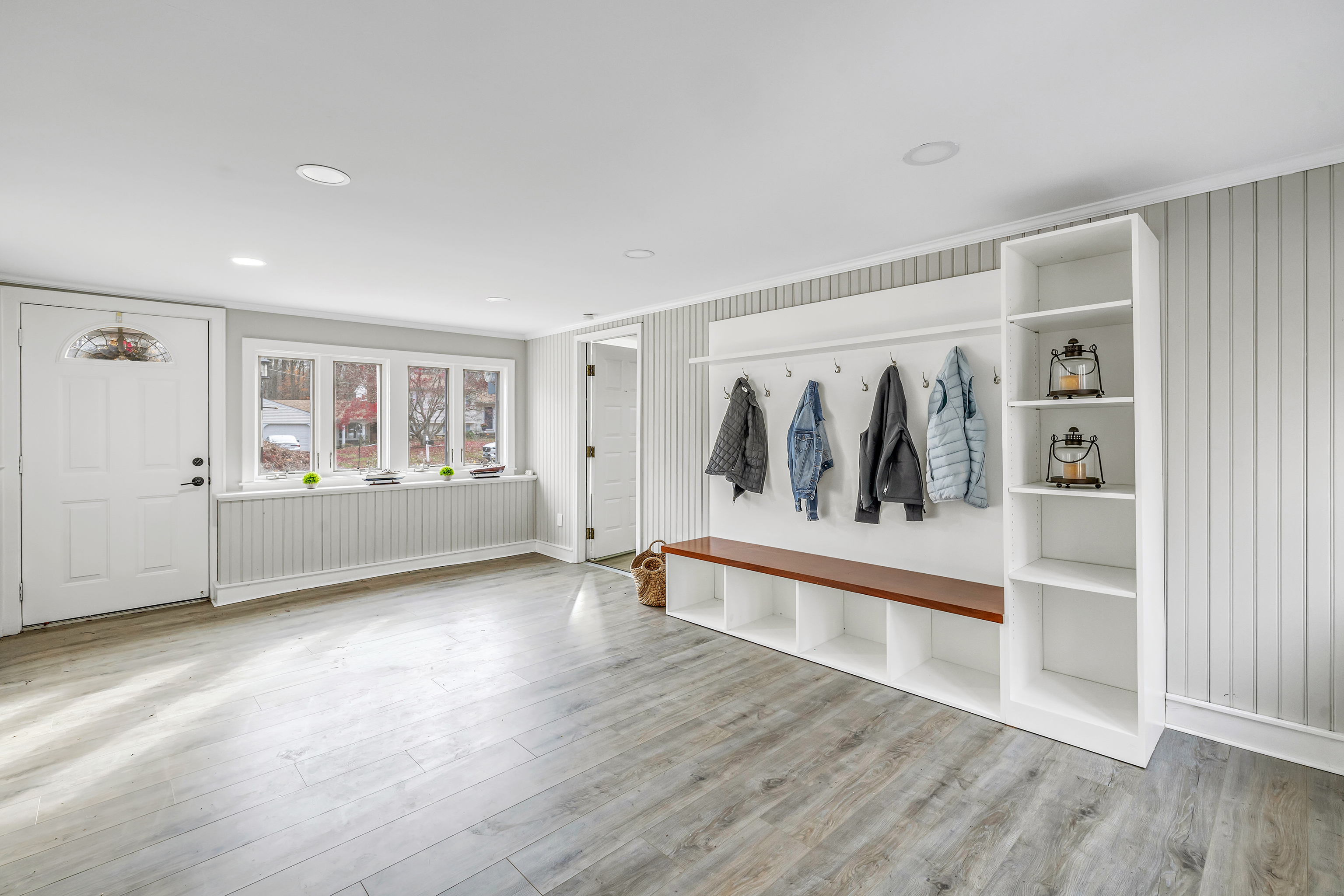 13 School Street Monroe, CT 06468 - Photo 18 of 29 a view of a big room with wooden floor and windows