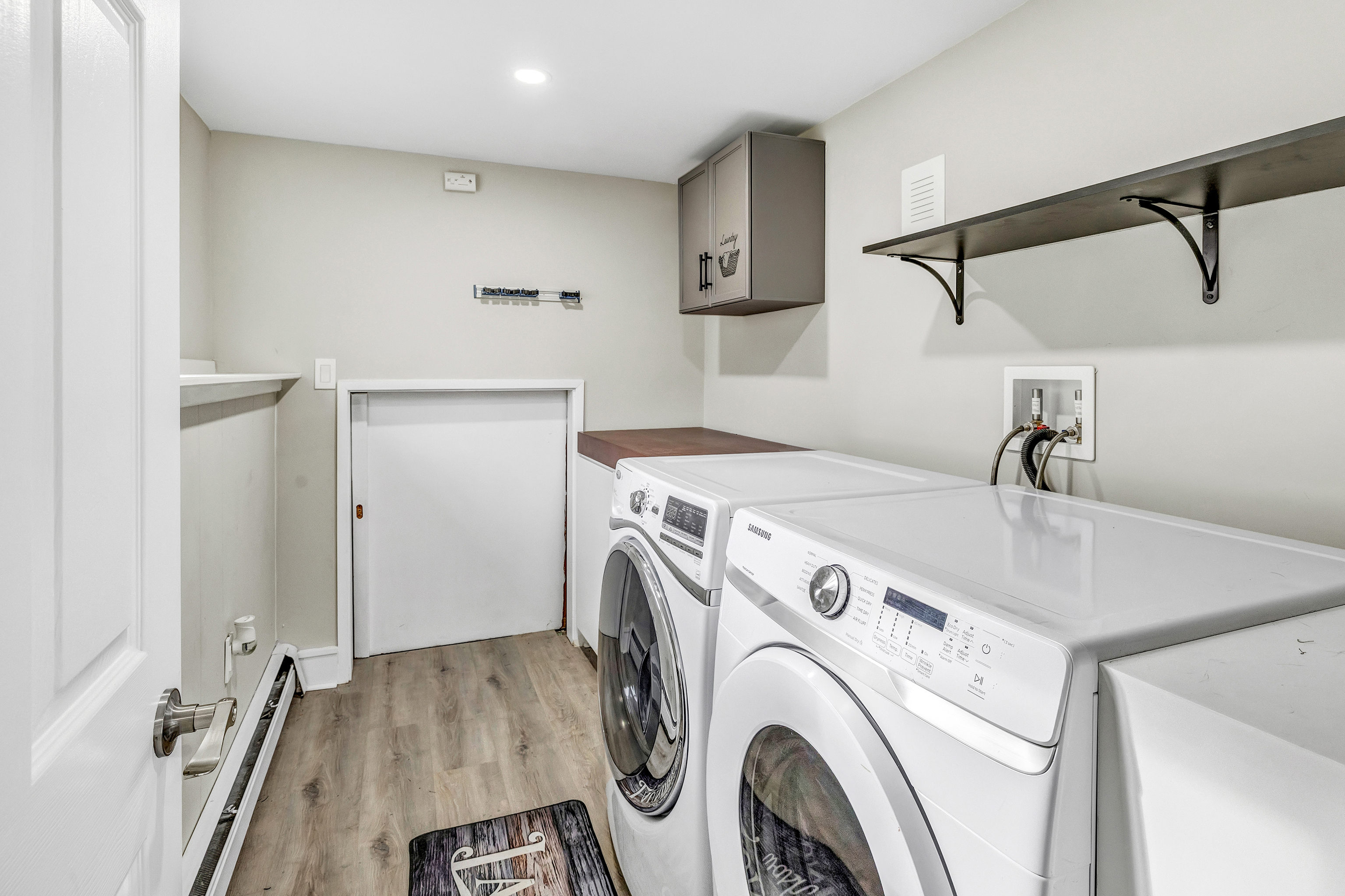 13 School Street Monroe, CT 06468 - Photo 22 of 29 a view of storage and utility room with washer and dryer