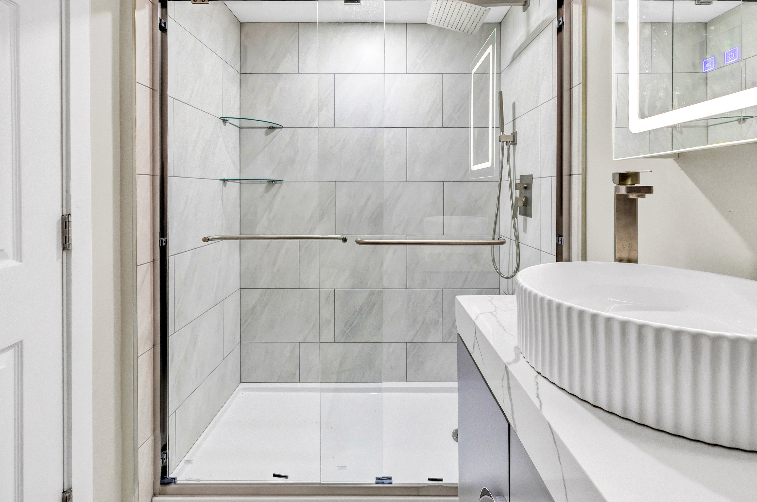 13 School Street Monroe, CT 06468 - Photo 25 of 29 a bathroom with a bathtub and shower