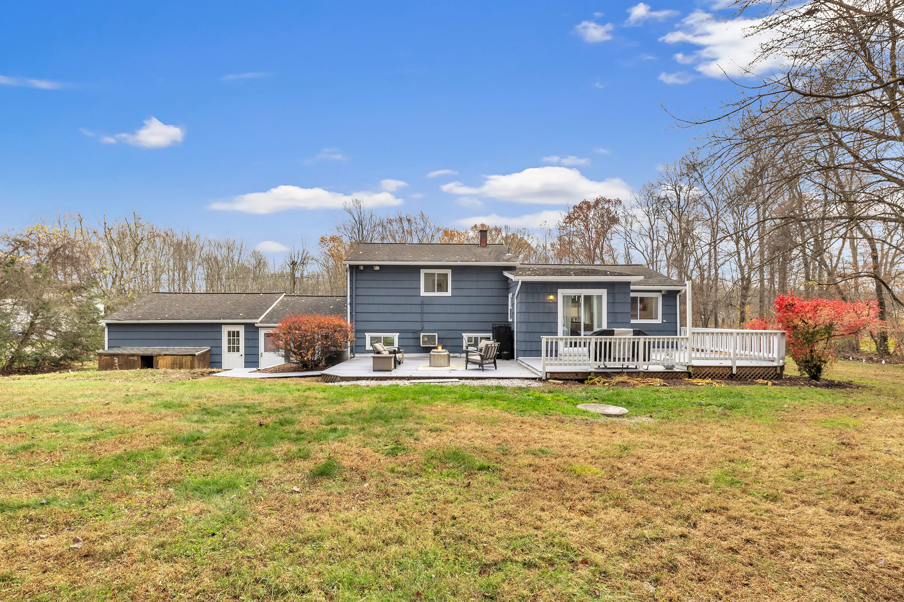 13 School Street Monroe, CT 06468 - Photo 26 of 29 a view of a house with swimming pool and a yard