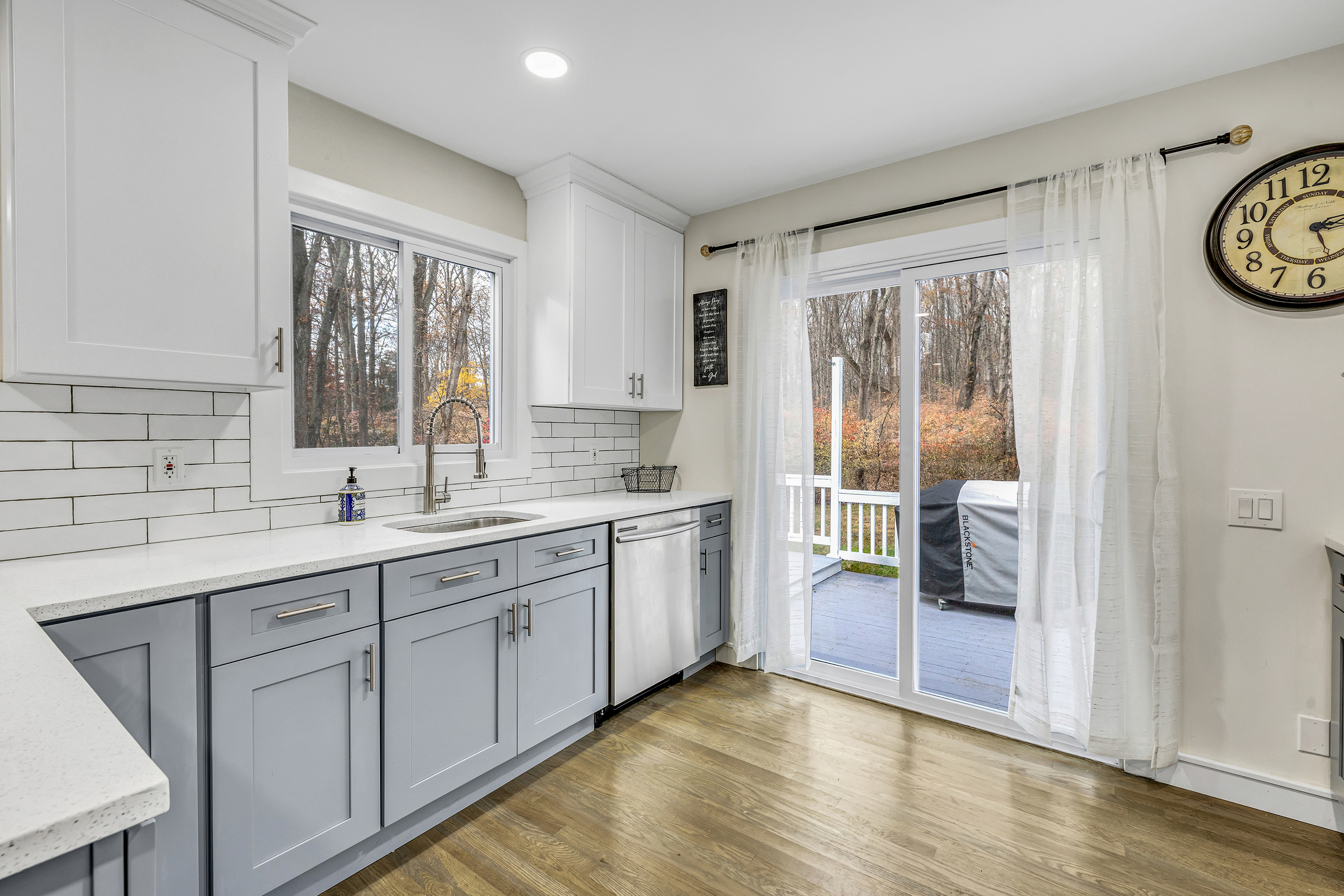 13 School Street Monroe, CT 06468 - Photo 3 of 29 a view of a kitchen with a sink and a window