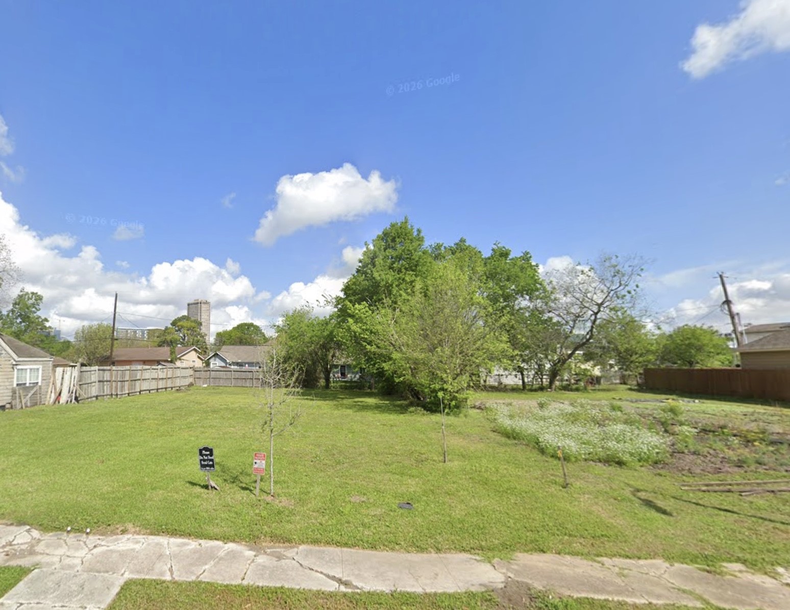 2939 Payson Street Houston, TX 77021 - Photo 2 of 7 a view of a golf course with a lake