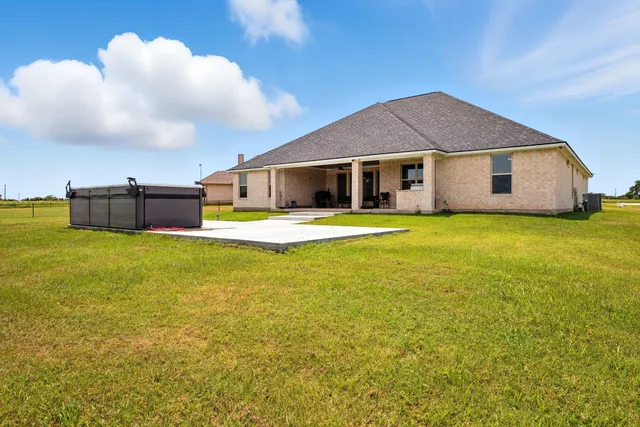 a front view of a house with swimming pool