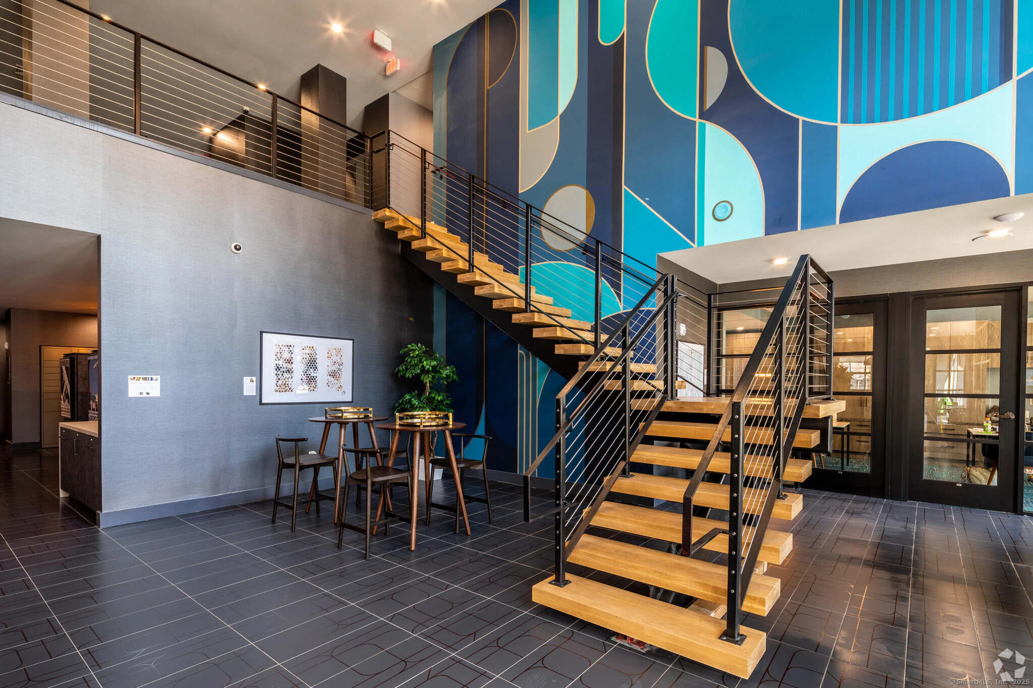 9 Tower Lane, Unit 514 New Haven, CT 06519 - Photo 14 of 14 a dining room with furniture and wooden floor