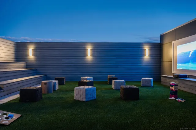 a backyard of a house with seating space