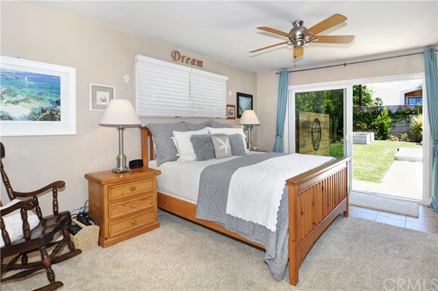 2612 Redlands Drive Costa Mesa, CA 92627 - Photo 18 of 30 a bedroom with a bed dresser and a window