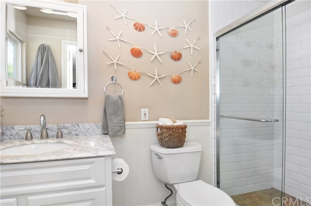 2612 Redlands Drive Costa Mesa, CA 92627 - Photo 19 of 30 a bathroom with a toilet sink and shower