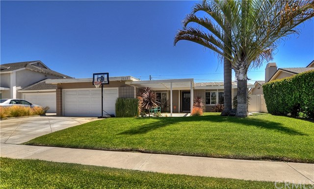 2612 Redlands Drive Costa Mesa, CA 92627 - Photo 2 of 30 a front view of a house with a yard and garage