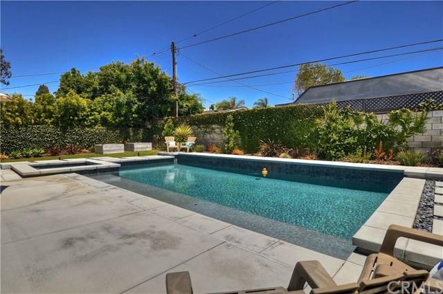 2612 Redlands Drive Costa Mesa, CA 92627 - Photo 23 of 30 a view of a swimming pool with a patio