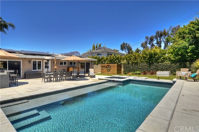 2612 Redlands Drive Costa Mesa, CA 92627 - Photo 24 of 30 a view of a house with swimming pool and sitting area