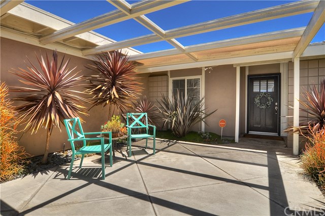 2612 Redlands Drive Costa Mesa, CA 92627 - Photo 4 of 30 a view of backyard with wheel chair and potted plants