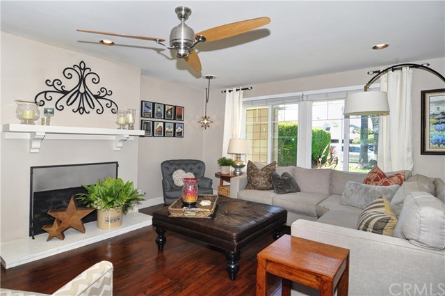 2612 Redlands Drive Costa Mesa, CA 92627 - Photo 6 of 30 a living room with furniture flower pot and a fireplace
