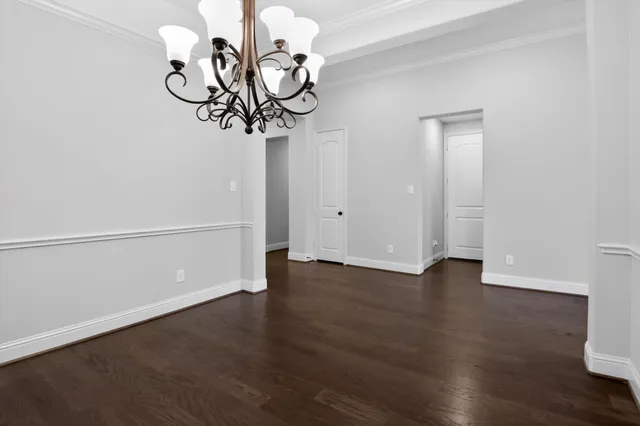 a view of a livingroom with wooden floor