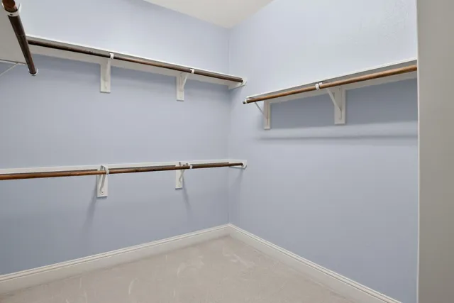 a view of a room with racks on the wall